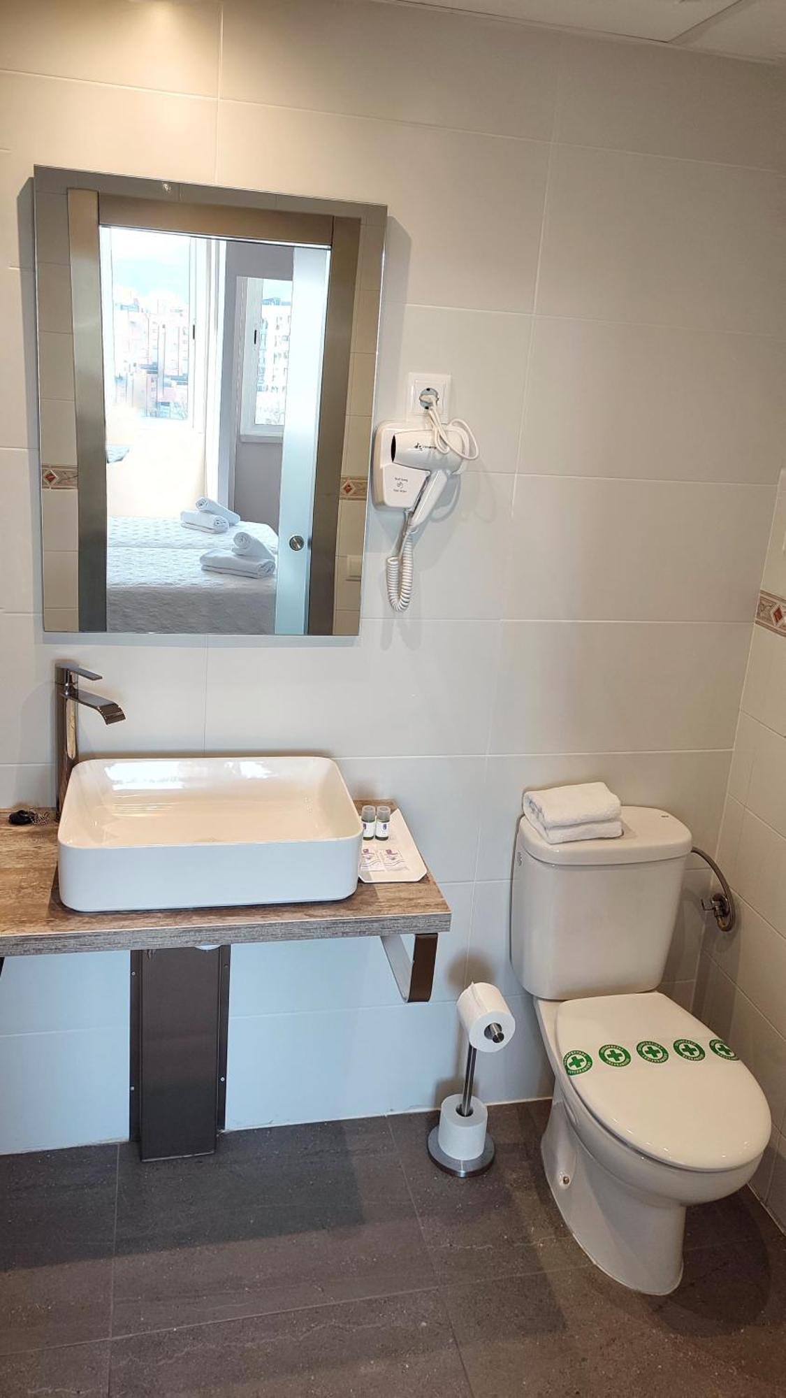 Aparthotel Montcada Pokoj fotografie